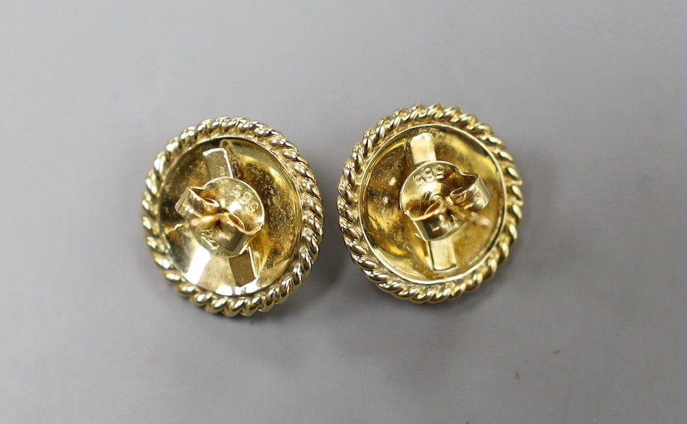 A modern pair of 585 yellow metal and cultured pearl set circular earrings, 15mm, gross weight 6.3 grams.